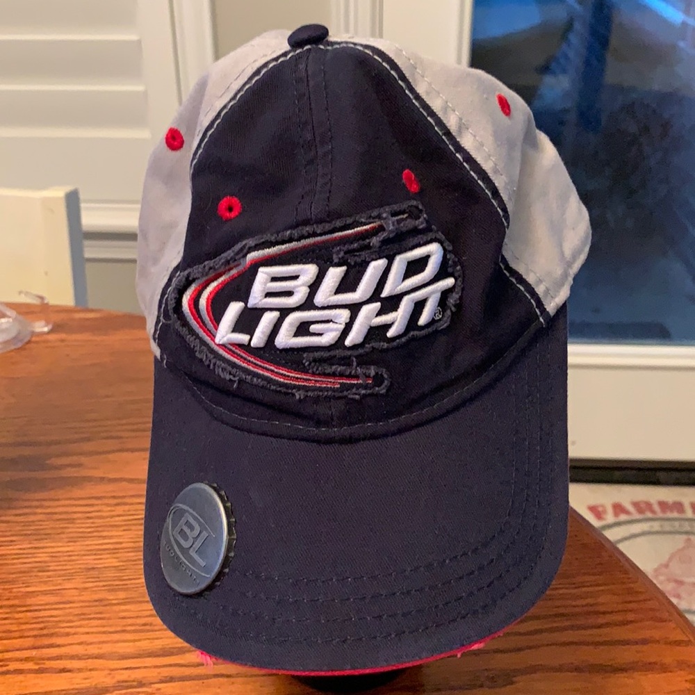 Official Anheuser - Bush Bud Light Hat with Bottle Cap opener on Bill. 2010
